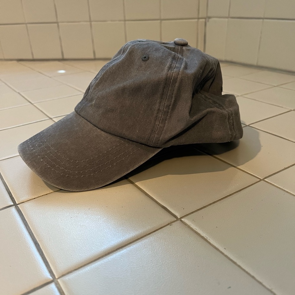 Gray high ponytail/messy bun baseball cap